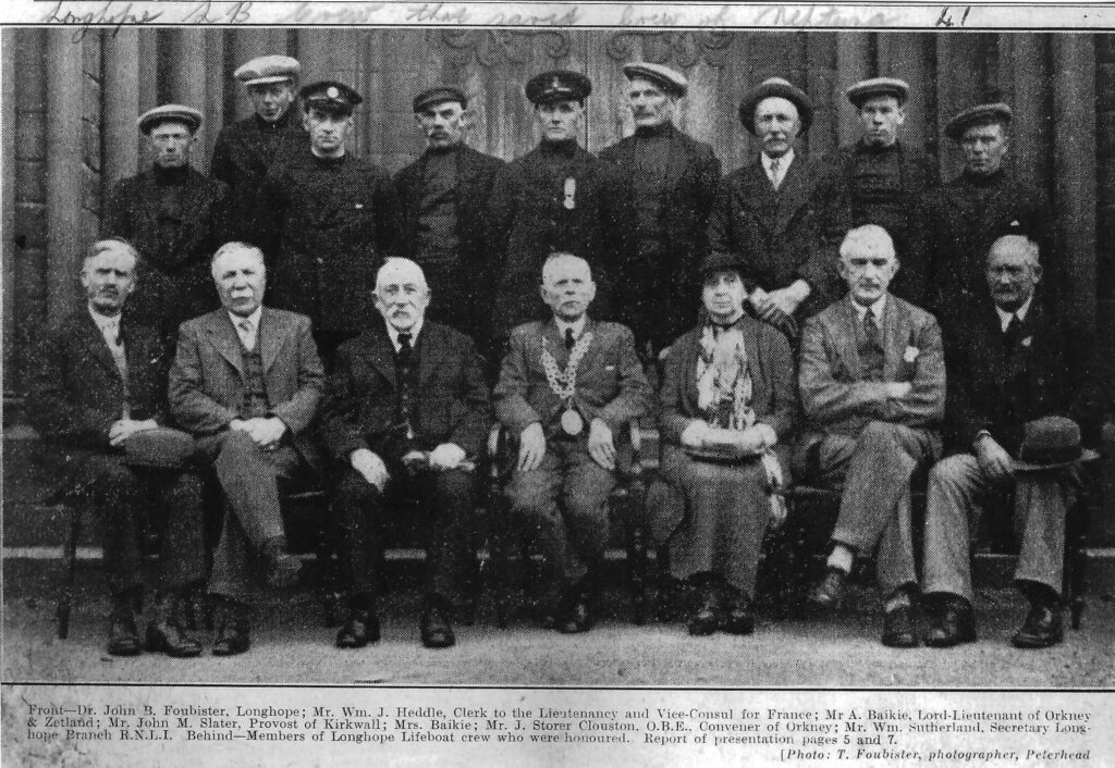 Photograph of the Longhope lifeboat crew and platform party at the French medal presentation, 1936